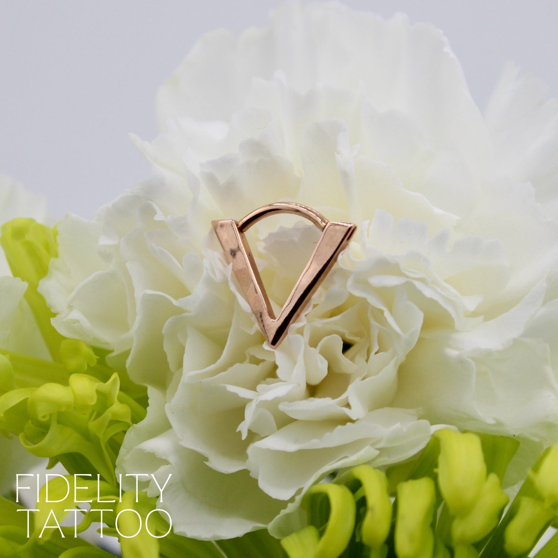 Triangle hinge ring Fidelity Tattoo Custom Tattooing Curated Piercing